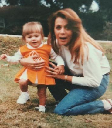Young Carla Ballerini with her daughter